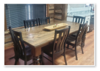 Custom built dining table in the Classic Farmhouse style built by Cattle Bend Woodworks.