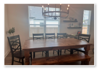 Custom built dining table in the Classic Farmhouse style built by Cattle Bend Woodworks.
