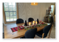 Custom built dining table in the Classic Farmhouse style built by Cattle Bend Woodworks.