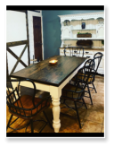 Custom built dining table in the Classic Farmhouse style built by Cattle Bend Woodworks.
