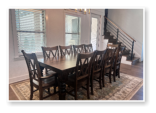 Custom built dining table in the Classic Farmhouse style built by Cattle Bend Woodworks.