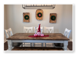 Custom built dining table in the Classic Farmhouse style built by Cattle Bend Woodworks.
