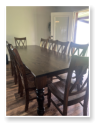 Custom built dining table in the Classic Farmhouse style built by Cattle Bend Woodworks.